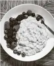  ?? Ekaterina Smirnova / Getty Images ?? A bowl of aatmeal and berries is a good example of a healthy plant-based meal.