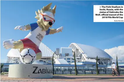  ?? Buda Mendes ?? > The Fisht Stadium in Sochi, Russia, with the statue of Zabivaka the Wolf, official mascot of the 2018 Fifa World Cup