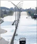  ?? THE ASSOCIATED PRESS ?? Some navigation apps can send people to closed or dangerous roads, such as a flooded section of Interstate 95 in Lumberton, North Carolina.