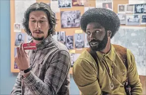  ?? DAVID LEE FOCUS FEATURES, VIA AP ?? Adam Driver as Flip Zimmerman and John David Washington as Ron Stallworth.