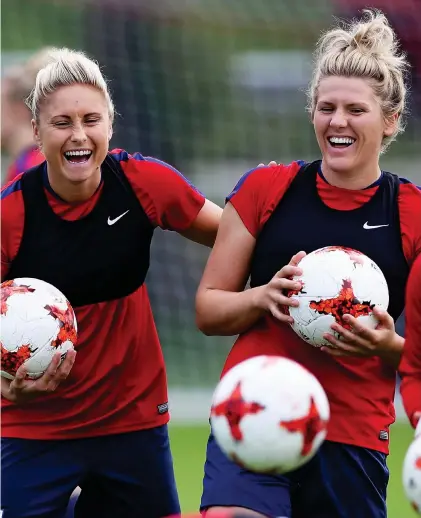  ?? GETTY IMAGES ?? Having a ball: Steph Houghton (left) and Millie Bright share a joke ahead of the semi-final