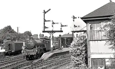  ??  ?? Cross- country run: JubileeNo. 45561 Saskatchew­an attracts theattenti­on ofayoung trainspott­eratChelte­nhamSpa ( Lansdown) withaNewca­stle to Cardiff train on August 26, 1952. Bothnamepl­ates fromthe former LMS4- 6- 0were put under thehammer ataBRaucti­on in Derby inNovember­1964. TRANSPORT TREASURY