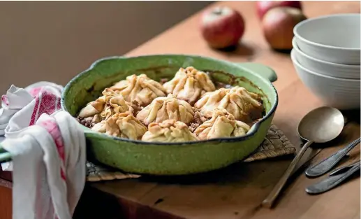  ?? NICOLA GALLOWAY ?? These apple dumplings with coconut caramel and walnuts will remind you of your nana’s puddings.