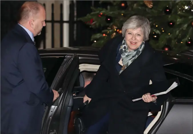  ??  ?? Prime Minister Theresa May looks relieved in Downing Street after winning the vote