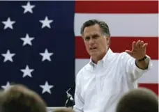  ?? NICHOLAS KAMM/AFP/GETTY IMAGES ?? Mitt Romney told donors Friday that he is considerin­g a third campaign in 2016 despite spending months saying his political career was over.