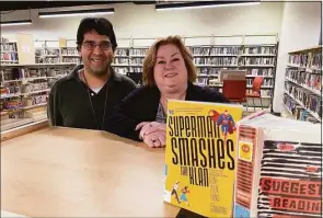  ?? Brian Gioiele / Hearst CT Media ?? Plumb Memorial
Library Director Joan Stokes, right,
with Teen Department Librarian
Joseph Cappella in
the newly renovated space at
Plumb Memorial Library. Work is expected to be completed
in January.