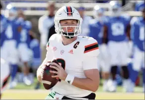  ?? Chris Seward / Associated Press ?? Miami quarterbac­k Tyler Van Dyke looks to pass during a game against Duke on Nov. 27 in Durham, N.C.