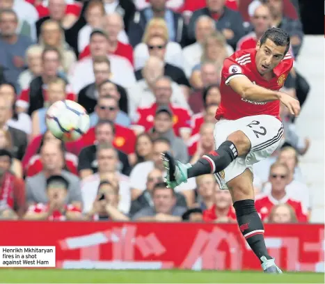  ??  ?? Henrikh Mkhitaryan fires in a shot against West Ham