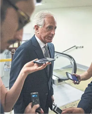  ?? AL DRAGO/GETTY IMAGES ?? Republican Sen. Bob Corker put forward a motion giving Congress “a role” in deciding tariffs.