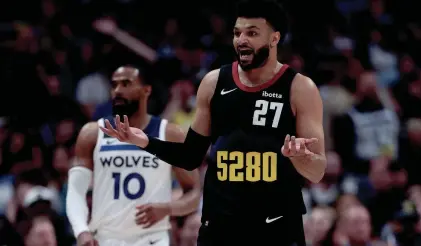  ?? MATTHEW STOCKMAN/GETTY IMAGES ?? The NBA fined Jamal Murray $100,000 on Monday for “throwing multiple objects in the direction of a game official during live play.”