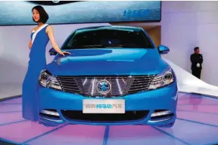  ?? —AFP ?? SHANGHAI: This file photo shows a DENZA EV car displayed during the first day of the 17th Shanghai Internatio­nal Automobile Industry Exhibition in Shanghai.