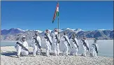  ??  ?? Indo Tibetan Border Police personnel celebrate Republic Day near the bank of Pangong Tso, in Ladakh on January 26, 2021.