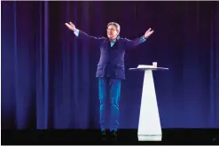  ??  ?? FRANCE: A picture taken in Cournon-d’Auvergne on the outskirts of Clermont-Ferrand, shows an hologram of French presidenti­al election candidate for the far-left coalition La France insoumise Jean-Luc Melenchon gesturing during a campaign meeting. —AFP