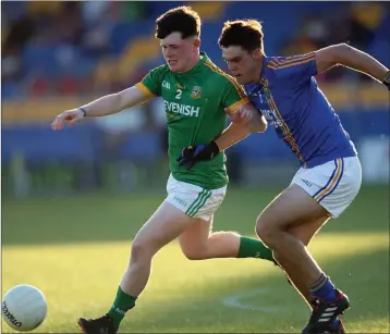  ??  ?? Wicklow’s Samuel Kearney competes with Adam Barrett during the Leinster MFC in Joule Park, Aughrim.