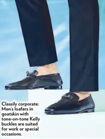  ??  ?? Classily corporate: Men’s loafers in goatskin with tone-on-tone Kelly buckles are suited for work or special occasions.