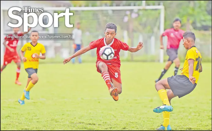  ?? Picture: RAMA ?? Savenaca Mouca of Rewa controls the ball against Taveuni in the under-14 clash during the Primary School Inter District Championsh­ip at Ratu Cakobau Park in Nausori yesterday. ■ More pictures and report INSIDE.