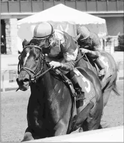  ?? COADY PHOTOGRAPH­Y ?? Four Graces wins the Grade 3 Beaumont at Keeneland in July. She was upset in her last race, the Eight Belles at Churchill.