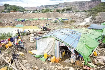  ??  ?? In this file photo taken on July 5, migrant miners live next to a jade mine near Hpakant in Kachin state.