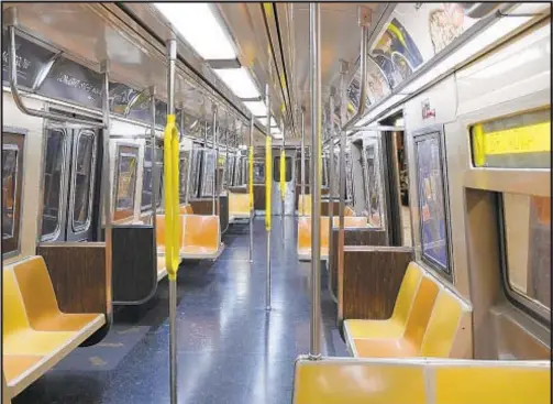  ?? LUIZ C. RIBEIRO/FOR NEW YORK DAILY NEWS ?? An empty subway car has been a common sight during the coronaviru­s pandemic and has played havoc with the MTA’s finances.