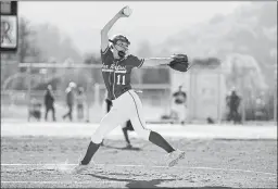  ?? PHOTOS BY ETHAN SWOPE — SPECIAL TO THE MARIN INDEPENDEN­T JOURNAL ?? Freshman Kelsey McNair pitches for the San Rafael Bulldogs during Wednesday’s softball game against Redwood High in Larkspur.