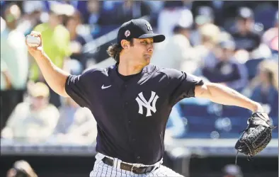  ?? Frank Franklin II / Associated Press ?? Yankees starting pitcher Gerrit Cole throws during a spring training game on Feb. 29 in Tampa, Fla.