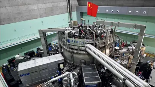  ?? IC ?? The experiment­al advanced supercondu­cting tokamak (EAST), nicknamed “China’s artificial sun,” in Hefei City, Anhui Province.