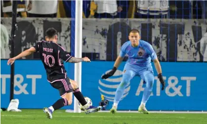  ?? Park. Photograph: Jayne Kamin-Oncea/USA Today Sports ?? Inter Miami’s Lionel Messi scores against LA Galaxy goalkeeper Jonathan Bond during the second half on Sunday at Dignity Health Sports