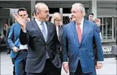  ?? ADEM ALTAN/GETTY-AFP ?? Turkish Foreign Minister Mevlut Cavusoglu, left, and U.S. Secretary of State Rex Tillerson arrive for their meeting.