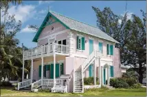  ?? CONTRIBUTE­D BY COURTESY OF BAHAMAS MINISTRY OF TOURISM ?? The historic Haynes Library in Governor’s Harbour is housed in a pink building.