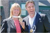  ?? AP ?? Tennis Hall of Fame inductees Helena Sukova (left) of the Czech Republic, and Michael Stich of Germany pose with their medals at the Internatio­nal Tennis Hall of Fame in Newport, Rhode Island, USA, on Saturday —