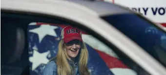  ?? AP ?? LOOKING TO WIN: Sen. Kelly Loeffler, R-Ga., arrives to speak at a campaign rally on Saturday in Cumming, Ga.