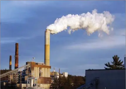  ??  ?? Steambillo­ws from the coal-fired Merrimack Station in Bow, N.H. As President Donald Trump announced a U.S. pullout last week from the Paris climate accord, he said the U.S. “will continue to be the cleanest and most environmen­tally friendly country on...