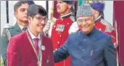  ??  ?? President Ram Nath Kovind felicitati­ng Parth Sarthi of Sanskriti n
School.