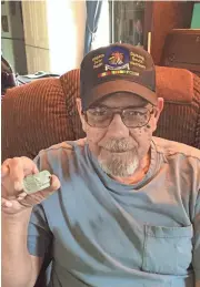  ?? DUAN COPELAND ?? Thomas Lee Rhyner, a Vietnam War veteran, received his lost dog tag through a University of Arizona program.