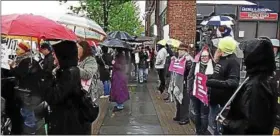  ?? MID-HUDSON NEWS NETWORK PHOTO ?? An estimated 200 activists turned out at noon Friday to protest outside the office of U.S. Rep. John Faso, R-Kinderhook, on Broadway in Kingston, N.Y.