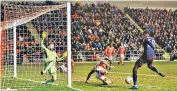  ??  ?? Blackpool rocked: Arsenal youngster Joe Willock scores second goal at Bloomfield Road