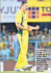  ??  ?? Australian bowler JP Behrendorf­f exults after taking a wicket during the second T20 cricket match against India in Guwahati on Tuesday