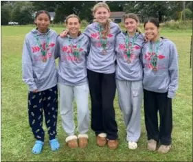  ?? COURTESY PHOTO ?? Medaling at the Frank Kelley Invitation­al for Lowell High were, from left, freshman Makyla King, freshman Abby Meade, sophomore Ella Machado, junior Sabrina Cady and senior captain Serena Nguyen.