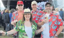 ?? Picture: Kim Cessford. ?? Top left: the Beach Boys on stage; top right: Mike Love; above: Steve Wilson, Pauline Mochan, Alan Gilbertson and Alan Gilbertson enjoying the festival.