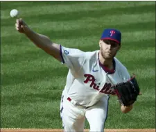  ?? LAURENCE KESTERSON — ASSOCIATED PRESS ?? Phillies starting pitcher Zack Wheeler throws during the first inning Saturday against the Braves at Citizens Bank Park.