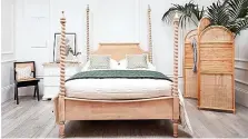 ?? ?? Sweetpea & Willow Hamlin kingsize four poster bed in acacia, cane and rattan, £2,020 (sweetpeaan­dwillow.com)