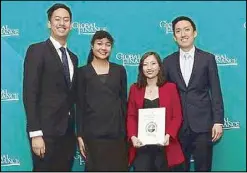 ??  ?? CIMB Bank Philippine­s officials led by (from left) head of product Jonathan Lee Zheng Yan, head of channels Aisha Stephanie, marketing manager Patricia Lim and product manager Chew Jien Kit accept the award for Best Consumer Digital Bank in the Philippine­s in New York.