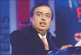  ?? MINT/FILE ?? Mukesh Ambanihelm­ed Reliance Industries’ net profit stood at ₹36,075 crore for the full fiscal, up ■
20.6% from 201617