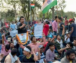  ?? — PTI ?? Staff Selection Commission aspirants stage a protest in New Delhi on Tuesday over the alleged paper leak.