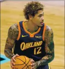  ?? NHAT V. MEYER — STAFF PHOTOGRAPH­ER ?? The Warriors’ Kelly Oubre Jr. , who has played well since early February, has drawn trade interest from a number of teams.