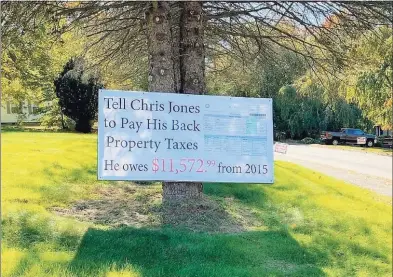  ?? Contribute­d photo ?? This is one of the signs on display in Shelton focusing on Third Ward Alderman candidate Chris Jones’s back taxes owed. Jones said he has begun a payment plan to cover those overdue taxes.