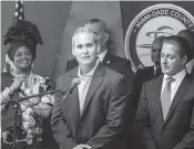  ?? CHARLIE ORTEGA GUIFARRO cguifarro@miamiheral­d.com ?? During a news conference in Miami on Thursday, Miami High Principal Benny Valdes, center, talks about his school earning an A grade for the first time.