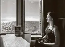  ?? Laetitia Vancon / New York Times ?? A woman rides a nearly empty ferry crossing the Baltic Sea between Rodbyhavn, Denmark, and Puttgarden, Germany.