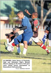  ?? Picture: SIBONGILE NGALWA ?? IN CONTROL: Dylan Denae of Pinelands High and Alexandra High’s Mncedi Masora playing at the finals of SA sport tours school soccer tournament at Beaconhurs­t field yesterday