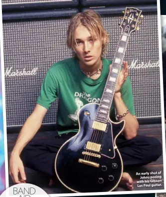  ??  ?? An early shot of Johns posing with his Gibson Les Paul guitar.